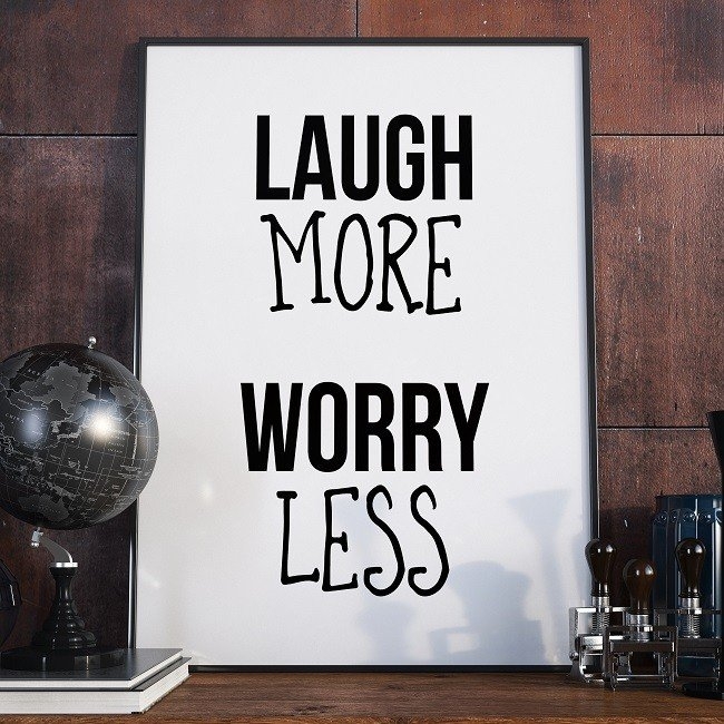 Laugh more worry less – plakat typograficzny w ramie, wymiary – 60cm x 90cm, wersja – białe napisy + czarne tło, kolor ramki – biały